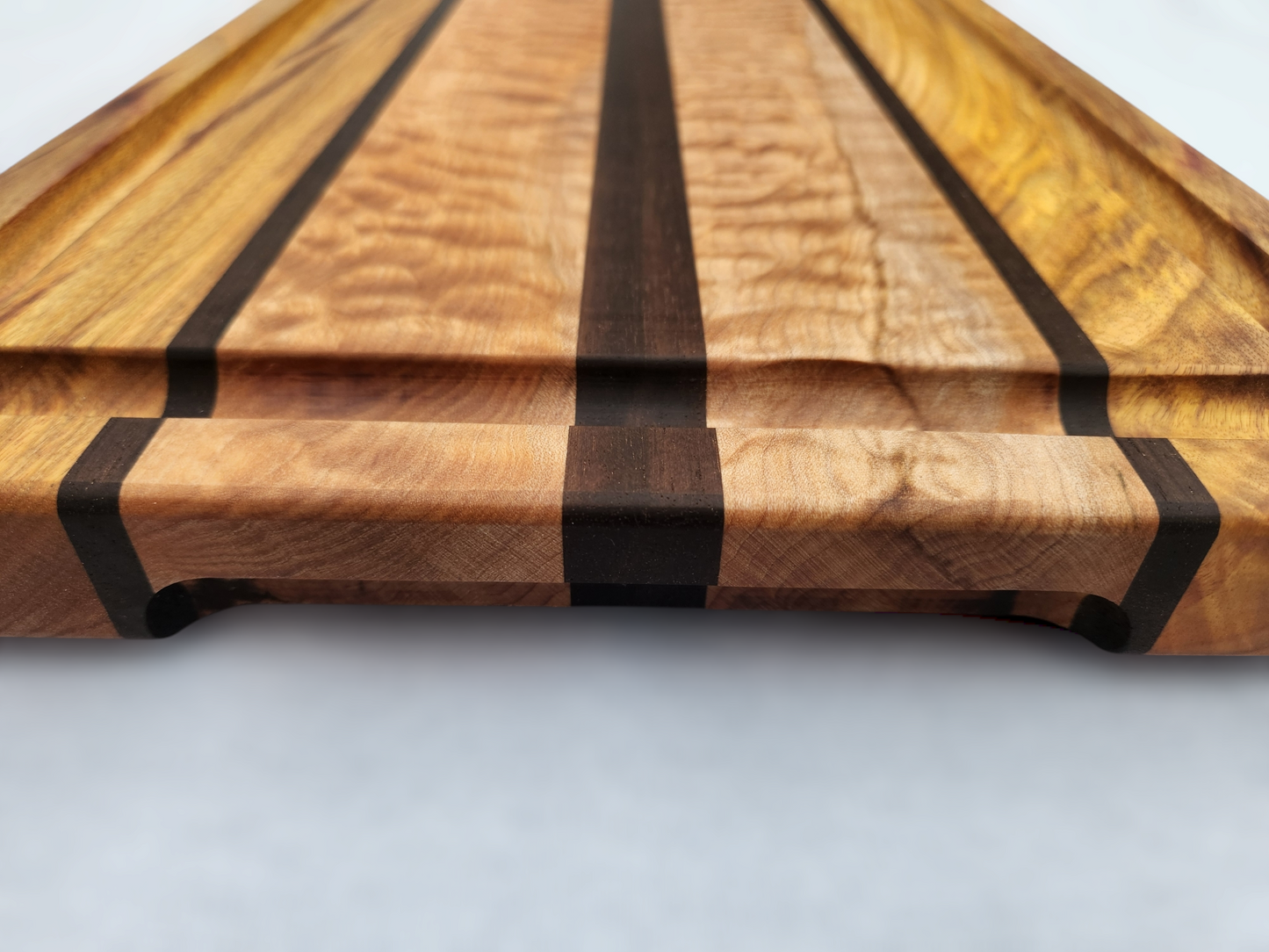 Canary Wood, Figured Maple & Peruvian Walnut Cutting Board