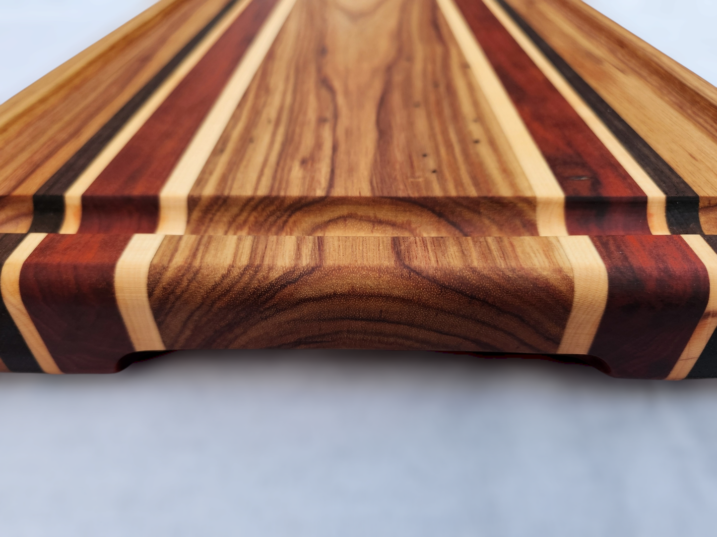 Canary Wood, Padauk, Maple & Walnut Cutting Board