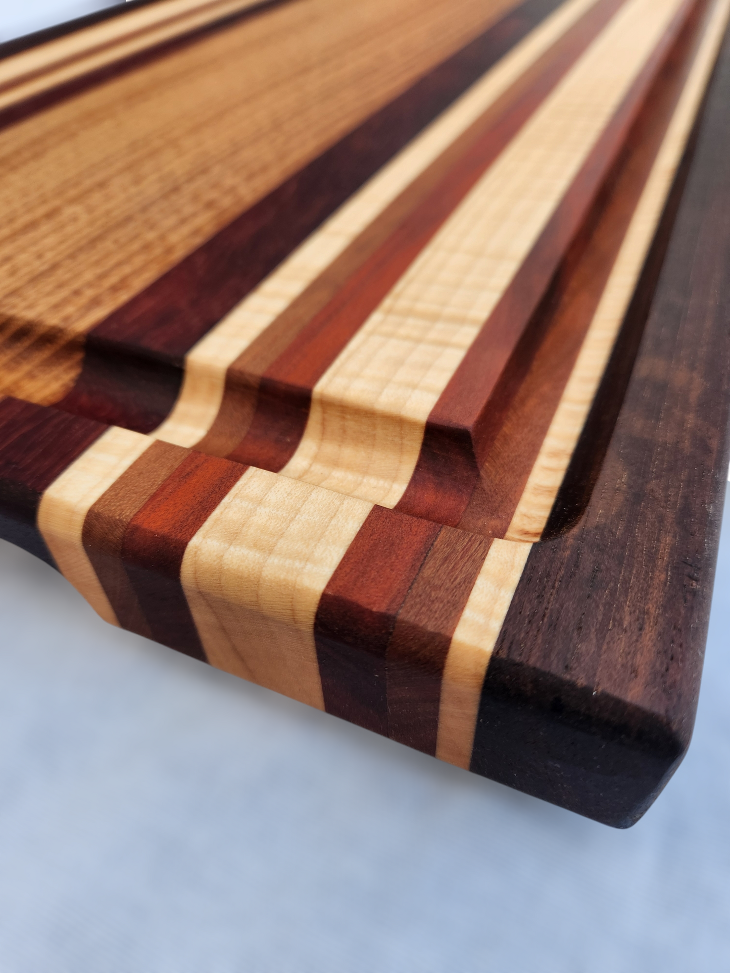 Russian Olive, Peruvian Walnut, Figured Maple, Cherry & Red Heart Cutting Board