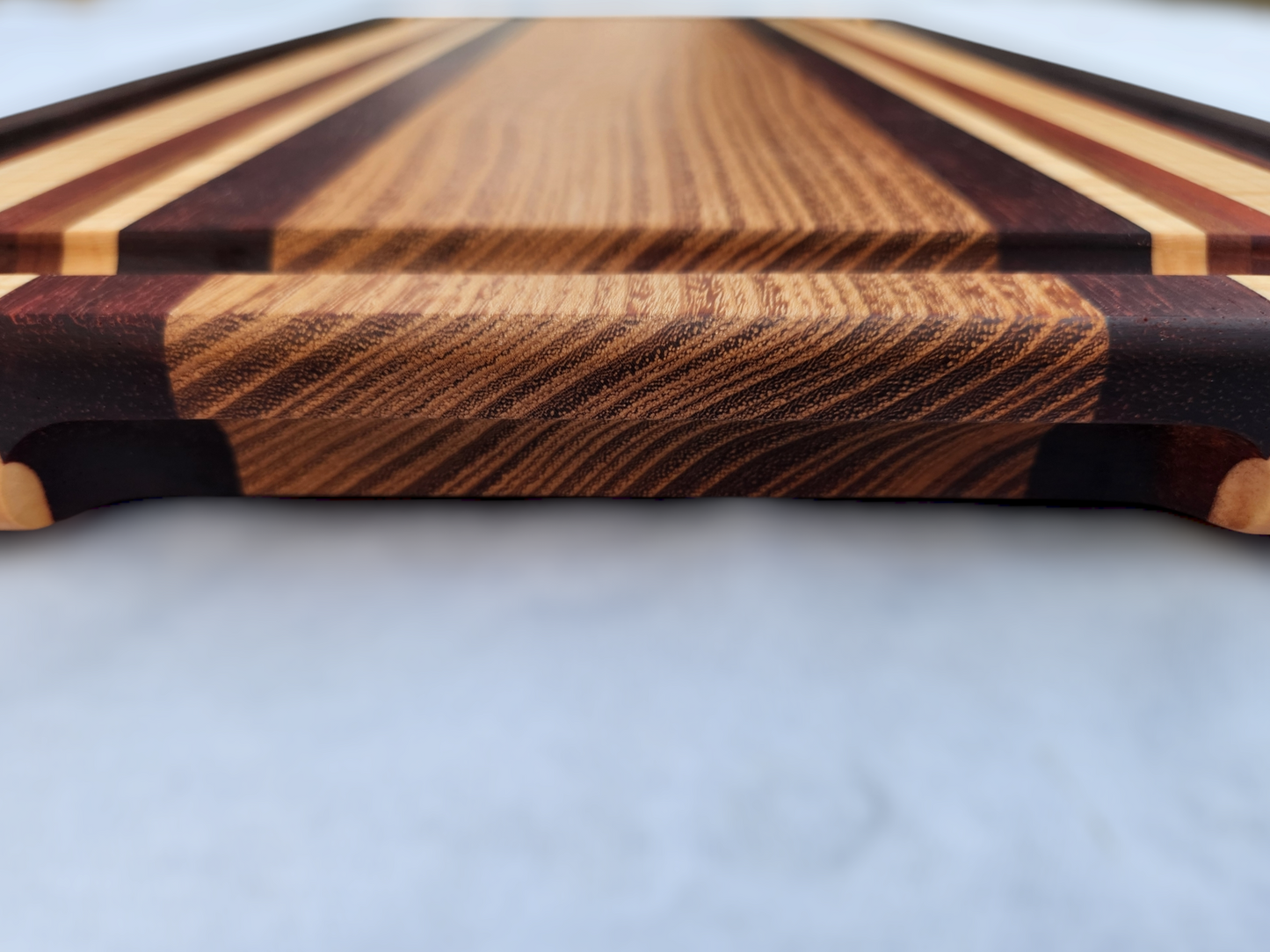 Russian Olive, Peruvian Walnut, Figured Maple, Cherry & Red Heart Cutting Board