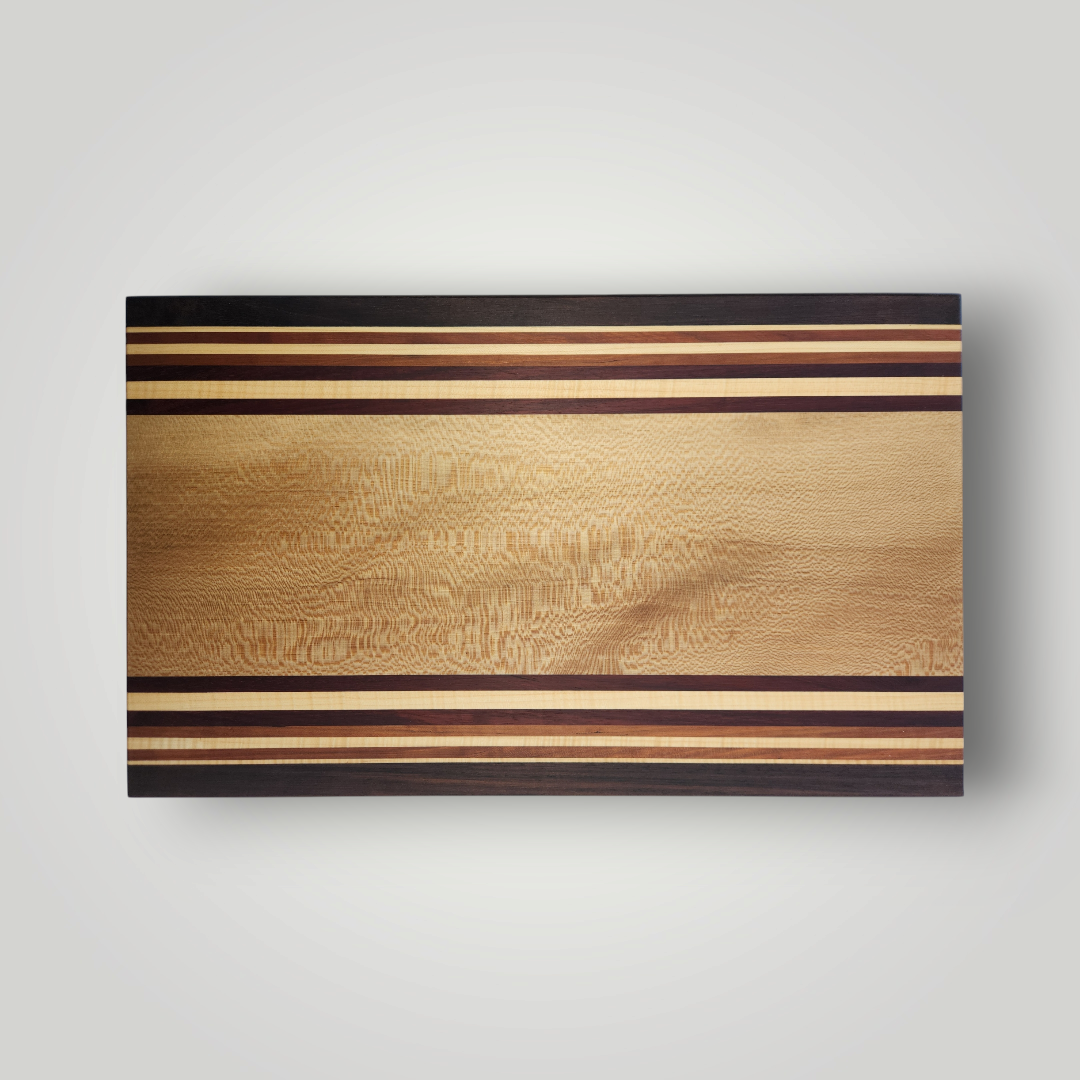 Figured Sycamore, Peruvian Walnut, Cherry, Maple & Blood Wood Cutting Board