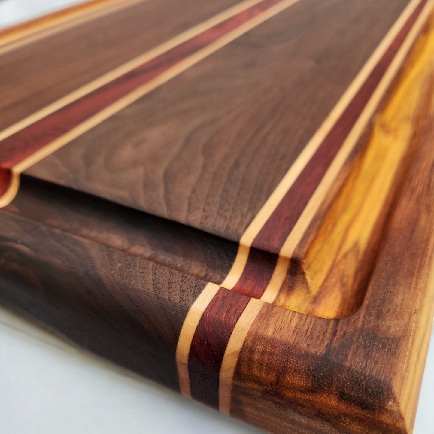 Canary Wood, Padauk, Black Walnut & Maple Cutting Board